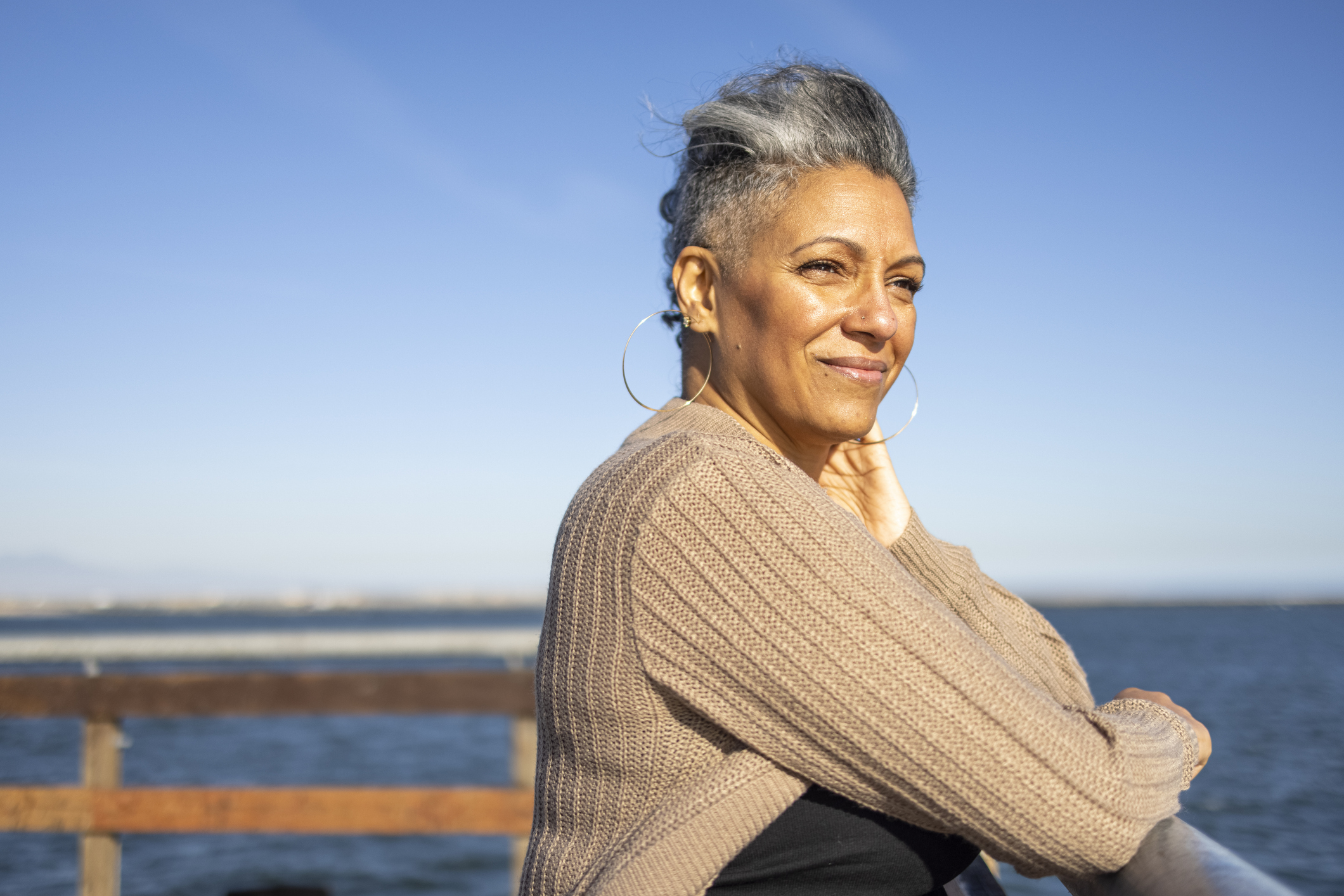 Mature Black Woman Relaxing At The Pier